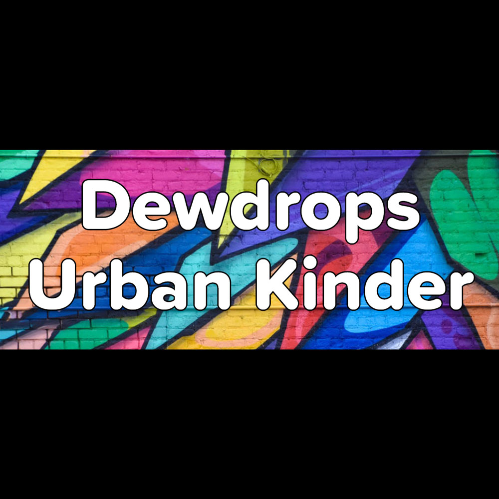 A graffiti-style wall art with the words "Dewdrops Urban Kinder" written in large, bold, white letters.